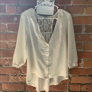 Cream blouse with back floral reveal